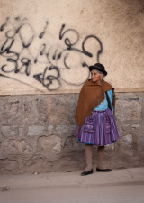 Woman Waiting for the Bus in Bolivia